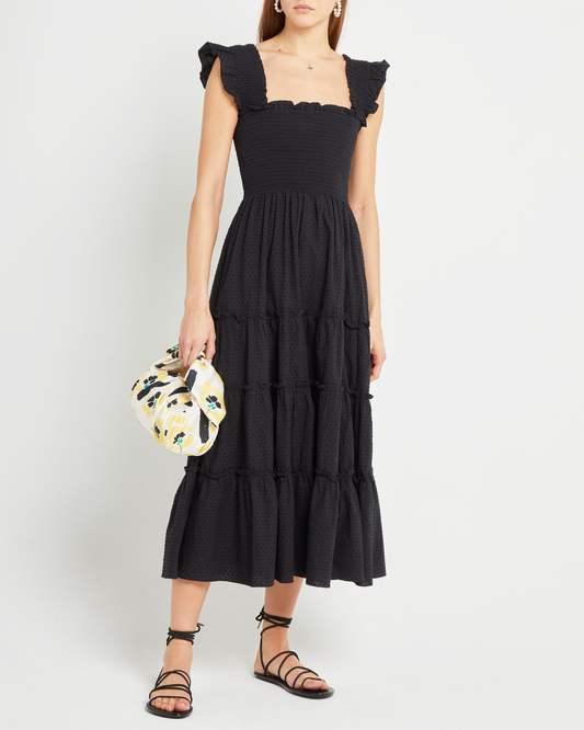 Third image of Calypso Maxi Dress, a black maxi dress, swiss dot material, smocked bodice, ruffles cap sleeves