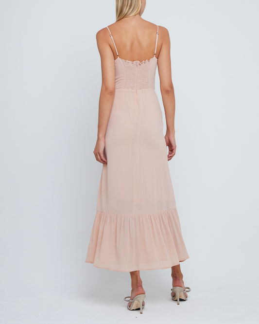 Second image of Evelyn Dress, a pink bridesmaid maxi-length dress with ruched bust detail, sweetheart neckline, tiered skirt, back smocking, adjustable straps, back zipper, and lining
