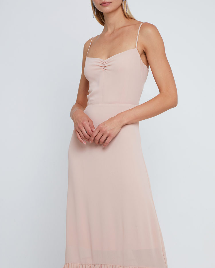 Fifth image of Evelyn Dress, a pink bridesmaid maxi-length dress with ruched bust detail, sweetheart neckline, tiered skirt, back smocking, adjustable straps, back zipper, and lining
