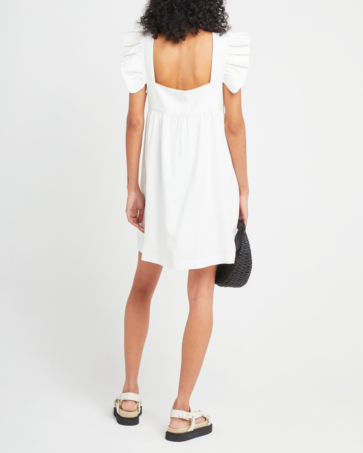 Second image of Aria Dress, a white mini dress, ruffle sleeves, retro, babydoll, loose, relaxed, square neckline
