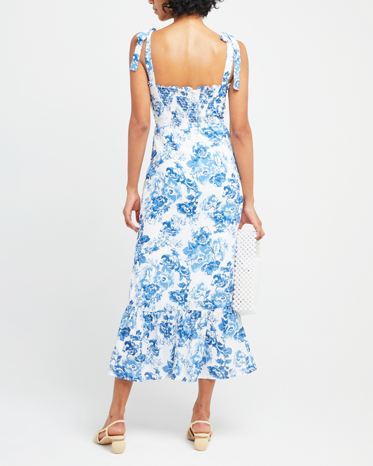 Second image of Toile de Jouy Dress, a blue midi dress, tie straps, ruffle details, toile, bows