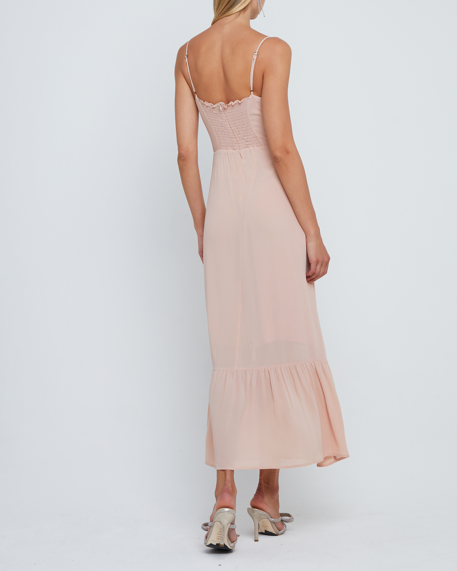 Fourth image of Evelyn Dress, a pink bridesmaid maxi-length dress with ruched bust detail, sweetheart neckline, tiered skirt, back smocking, adjustable straps, back zipper, and lining